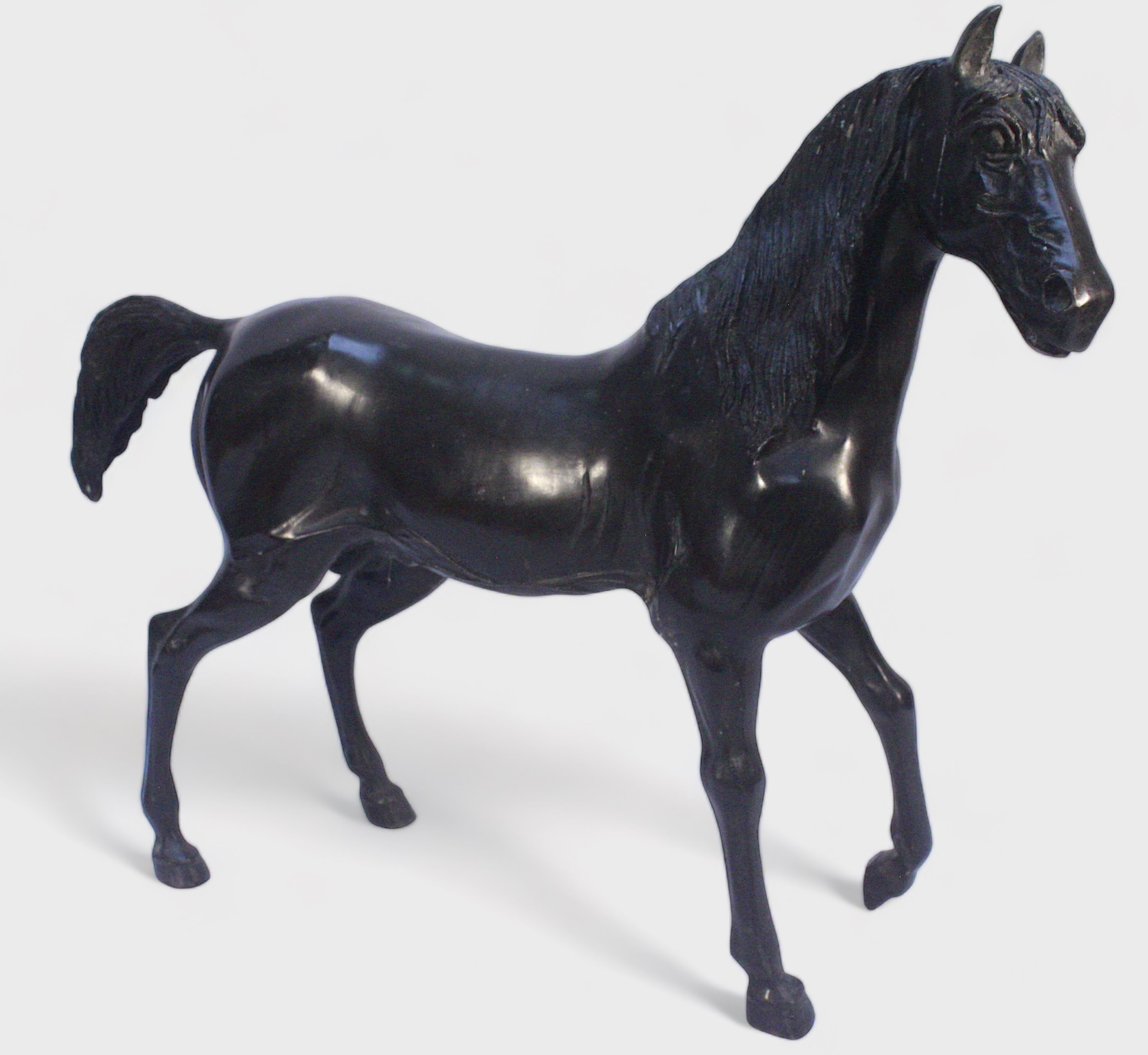 A large 'lost wax' cast and patinated bronze model of a Stallion, 46x60cm