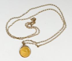A 1/10th Kruggerand coin in pendant mount and 9ct gold fine belcher link chain, total weight 6.4