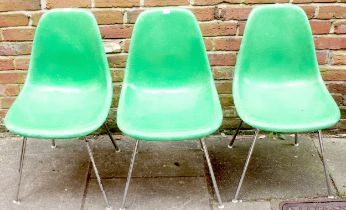 Charles & Ray Eames for Herman Miller, three DSX shell chairs moulded from fibreglass in a green