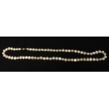 A string of cultured baroque pearls, with 14ct gold faceted spherical clasp, in Artisans of the