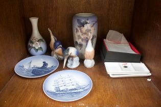 Seven pieces of Royal Copenhagen porcelain including three kingfisher models, two vases and set