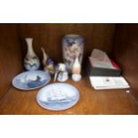 Seven pieces of Royal Copenhagen porcelain including three kingfisher models, two vases and set