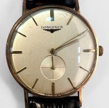 A vintage 9ct gold cased gents Longines wristwatch, C.1950’s, the silvered dial with gilt batons