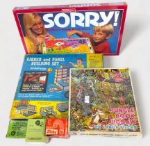 A collection of assorted vintage toy sets, to include a train set, slot car racing set and