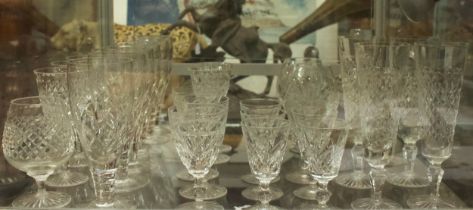 A collection of assorted cut-glass comprising, Stuart Crystal, Royal Doulton and Tudor Glass, to