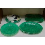 A collection of late 19th/early 20th Century Wedgwood majolica leaf-moulded plates and dishes,