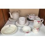 A collection of 'carried' railway ceramics, comprising L.M.S. Hotels teapot and side plate, white