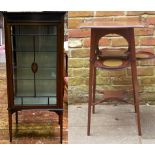 An Edwardian stained walnut single door display cabinet, and an Edwardian stained wood jardinière