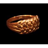 A 9ct gold keeper ring, gross weight approximately 5.1g