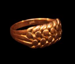 A 9ct gold keeper ring, gross weight approximately 5.1g