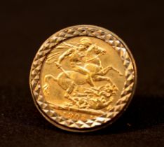 An Edward VII 1903 22ct gold full Sovereign, in 9ct gold ring mount, gross weight approximately 12g