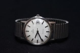 A gents stainless steel manual wind Omega Geneve wristwatch, the silvered dial with batons