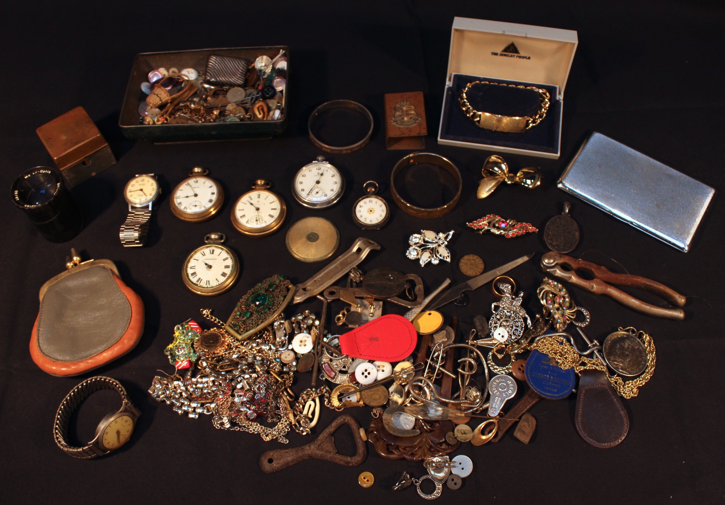 A collection of assorted costume jewellery including brooches, rings, chains and earrings etc.