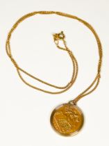 A 22ct gold half Sovereign in 9ct gold pendant mount, suspended on 9ct yellow gold fine-curb link