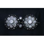 An Antique Diamond Brooch, of double floral design, set with in white-metal, silver and gold with