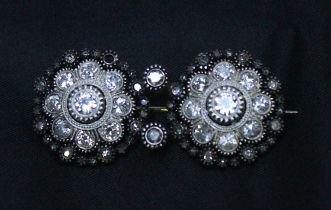 An Antique Diamond Brooch, of double floral design, set with in white-metal, silver and gold with