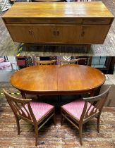 A G-Plan oval extending dining table and four rosewood chairs, (some fading) together with a