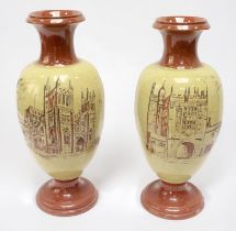 A pair of large glazed stoneware pottery vases, of baluster ovoid form with flared rim and