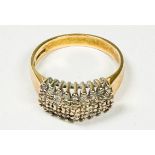 An 18ct yellow gold dress ring, set with 5 x rows of small diamonds, estimated total diamond