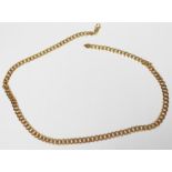 A 9ct yellow gold curb-link chain, weighs 23.9 grams, measures 20 inches.