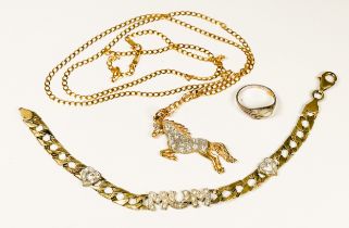 A 9ct gold horse pendant set with faceted white stones to the body and eye, suspended on a 9ct