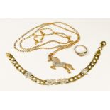 A 9ct gold horse pendant set with faceted white stones to the body and eye, suspended on a 9ct