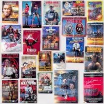 Twenty-one assorted Action and Adventure film posters for UK and German audiences, many for 1980s