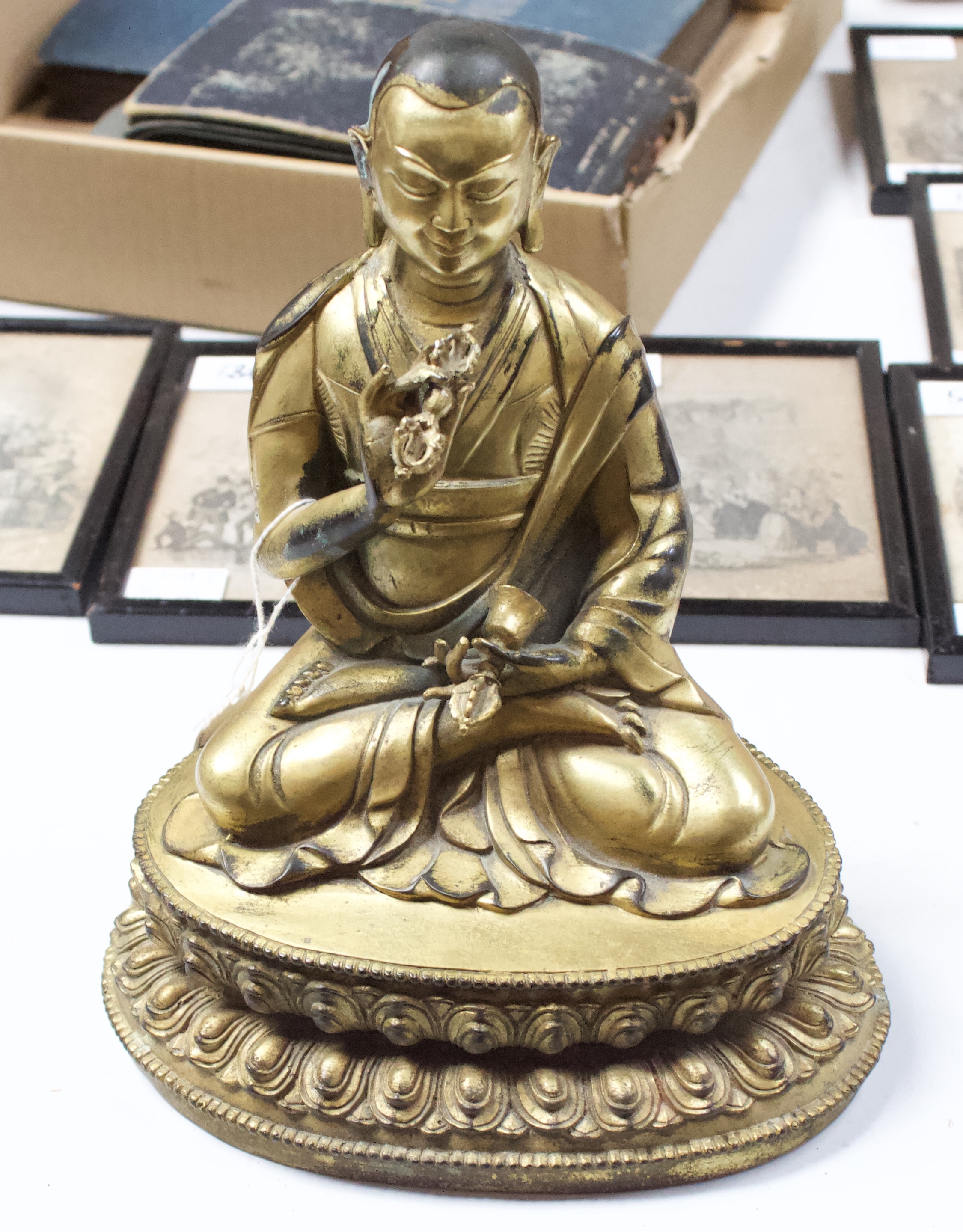 A Gilt-bronze Tibetan style Buddha, seated in lotus position and holding a vajra and meditiation - Image 4 of 14