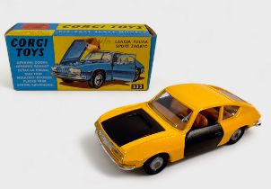 A boxed Corgi Toys ‘332’ Lancia Fulvia Sport Zagato, yellow body with black doors and bonnet, and