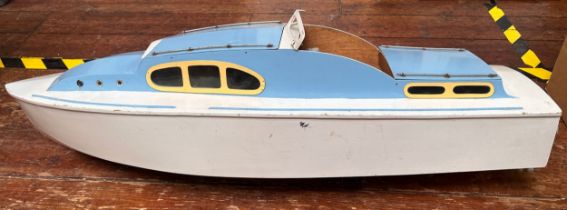 An Aerokits 'Sea Queen' cabin cruiser model boat, fitted with motor, blue and white, 118cm long