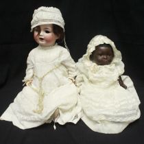 Two 20th Century bisque head dolls, comprising Heubach Koppelsdorf five-piece jointed bent-limb