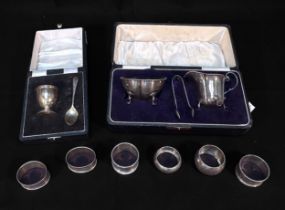 A cased silver sugar bowl, tongs and cream jug, in fitted box, hallmarked Birmingham, 1949, by