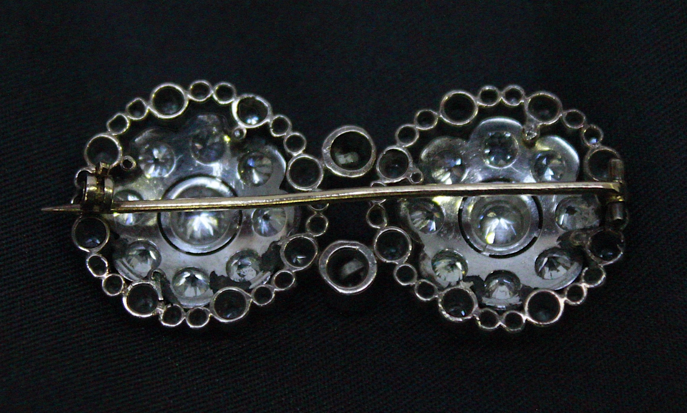 An Antique Diamond Brooch, of double floral design, set with in white-metal, silver and gold with - Image 2 of 2