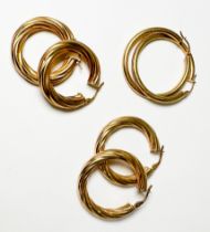 Two pairs of 9ct gold twist hoop earrings, and a pair of 9ct gold plain hoop earrings, total