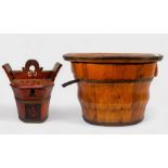 A Chinese coopered oval wooden barrel with detachable baby-bath top, together with a coopered wooden