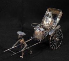 A Chinese Export White Metal novelty Rickshaw condiment set, (tests as .800 or higher), by Wang Hing