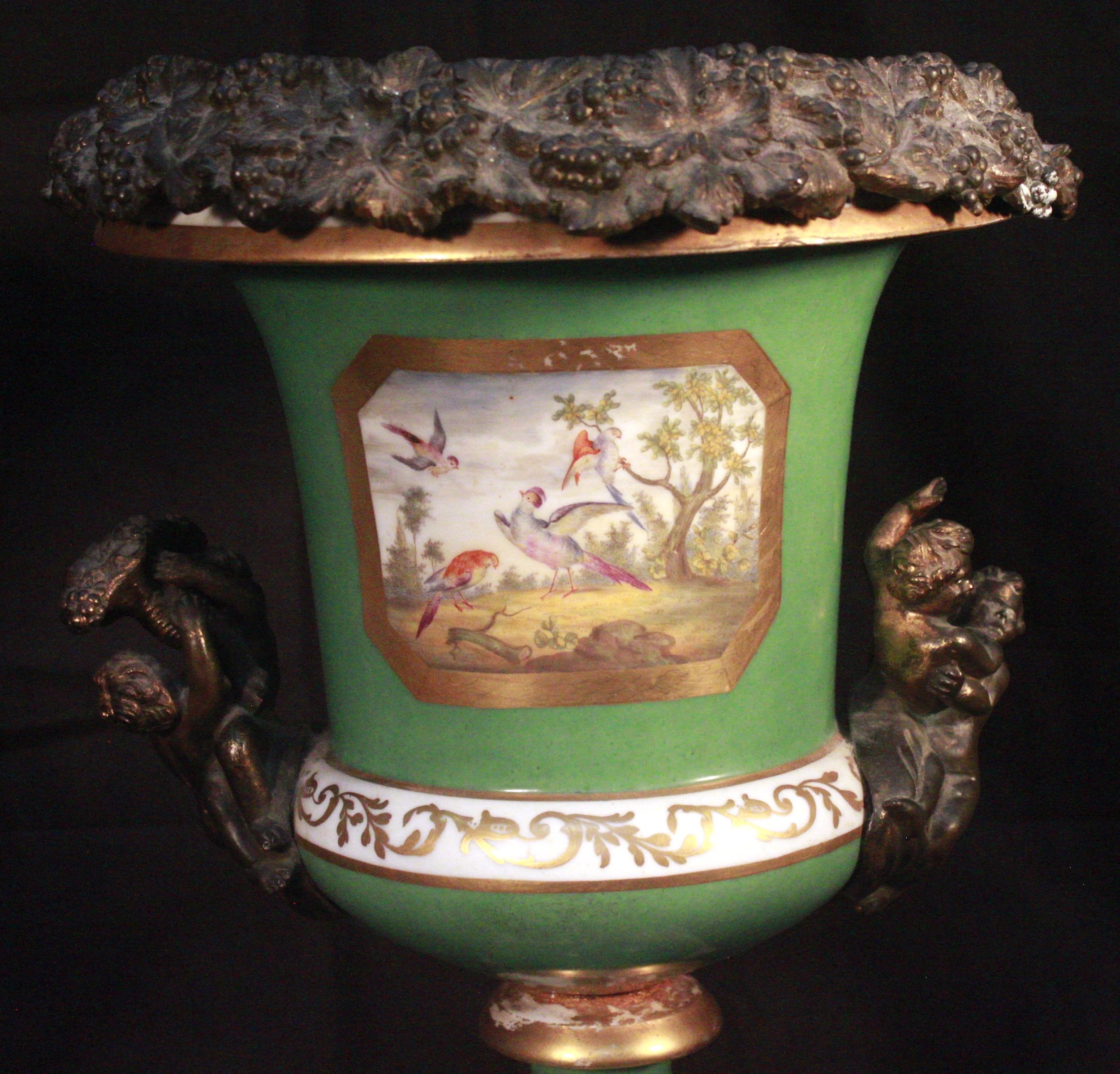 A late 18th century ormolu-mounted Sevres 'style' Porcelain campagna urn, painted in polychrome