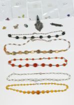 Various items of costume jewellery including five crystal bead necklaces, a silver bar brooch, a