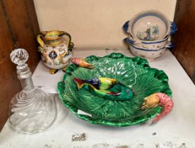 Three French Quimper Faience bowls painted with Bretton figures, an Italian Maiolica globular vase