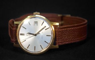 A gold-plated Omega Automatic Geneve wristwatch, the silvered dial with gilt batons denoting hours