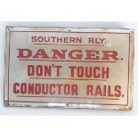 A Southern Railway enamel sign, red text to white ground, ‘Southern Rly. DANGER. Don’t Touch