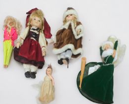 Seven assorted 20th Century dolls, including a boxed Chiltern doll, vintage Barbie examples, etc.