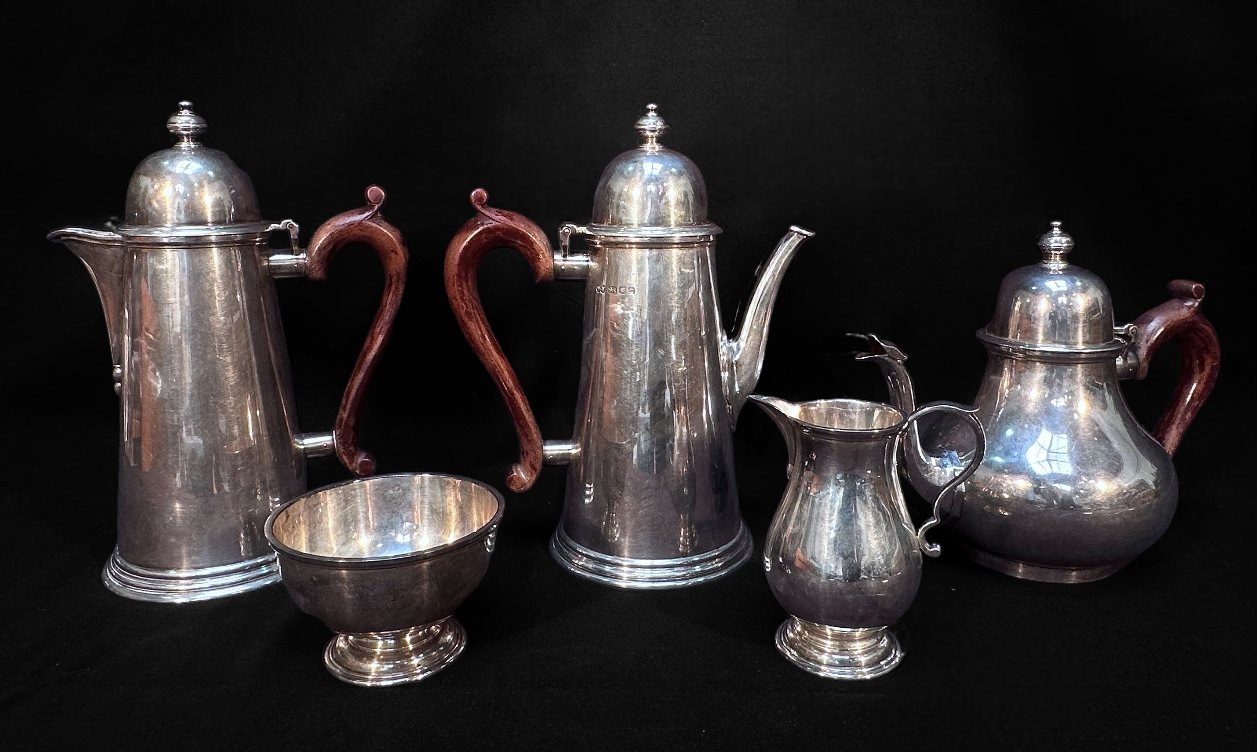 A George I 'Style' Silver Five-Piece Tea, and Coffee Set, with cream jug, sugar bowl and hotwater