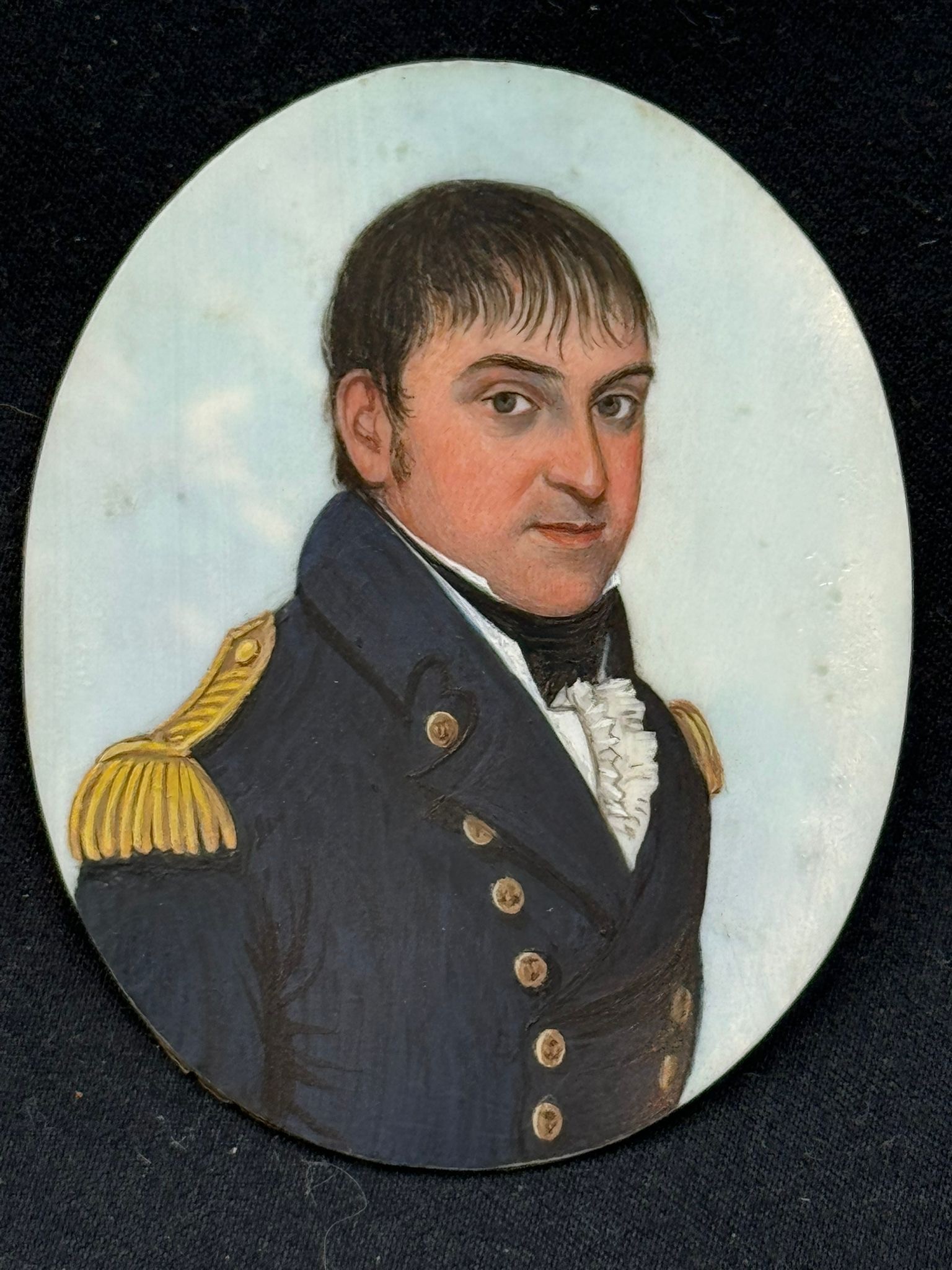 Attributed to Frederick Buck (1771 – c1839/40), A 19th century oval portrait miniature of a naval