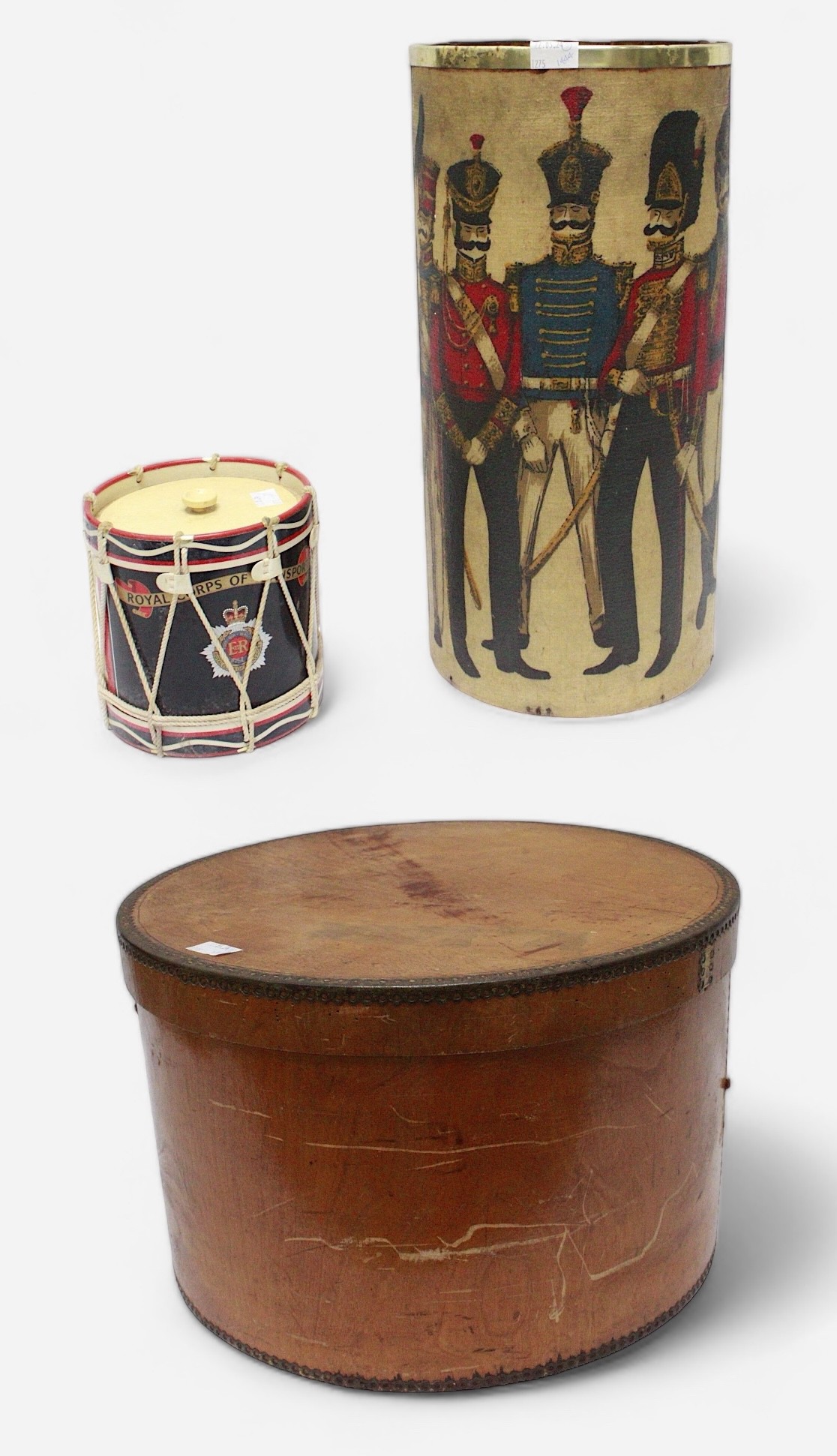 An early 20th century plywood snare drum box, 42 diam x 27cm high, together with a cylindrical