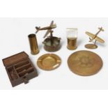 A small collection of assorted WWI and WWII trench art items including ashtrays, vases and ornaments