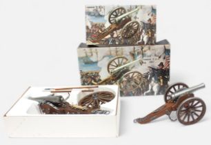 Two scale model wood and metal antique Civil War cannons by Denix, including ref. 401 and 402.