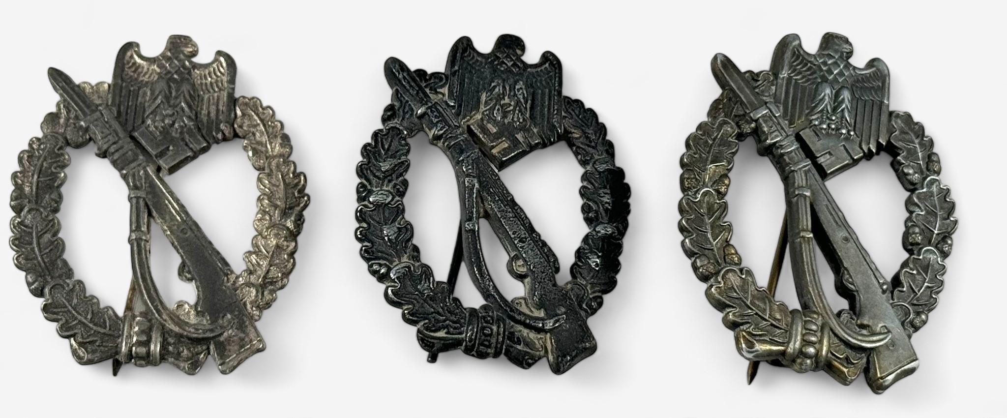 Three various WW2 German Third Reich Infantry Assault badges, various alloys and makers stamps, (3)