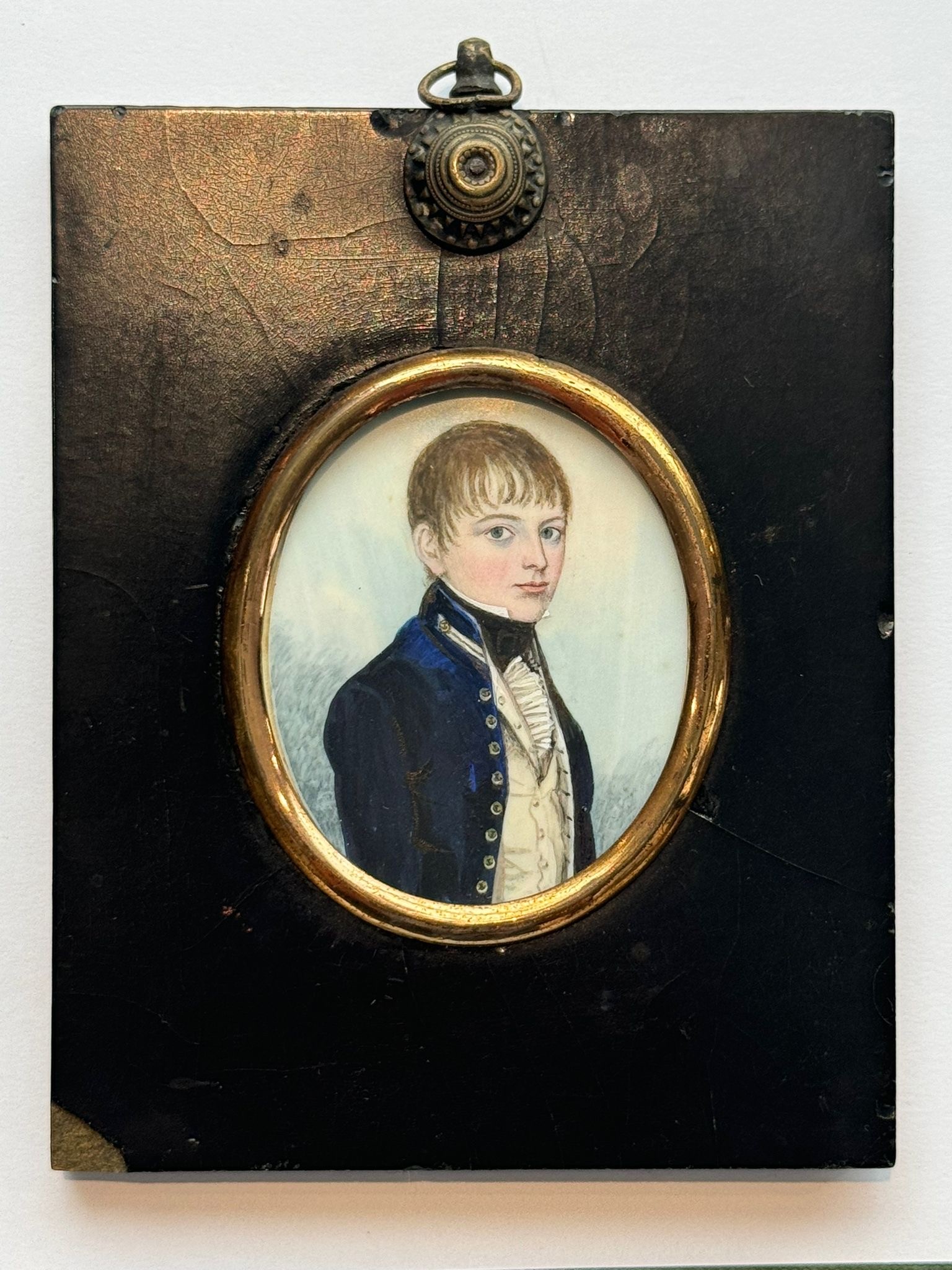 Attributed to Frederick Buck (1771 – c1839/40), A 19th century oval portrait miniature of a young