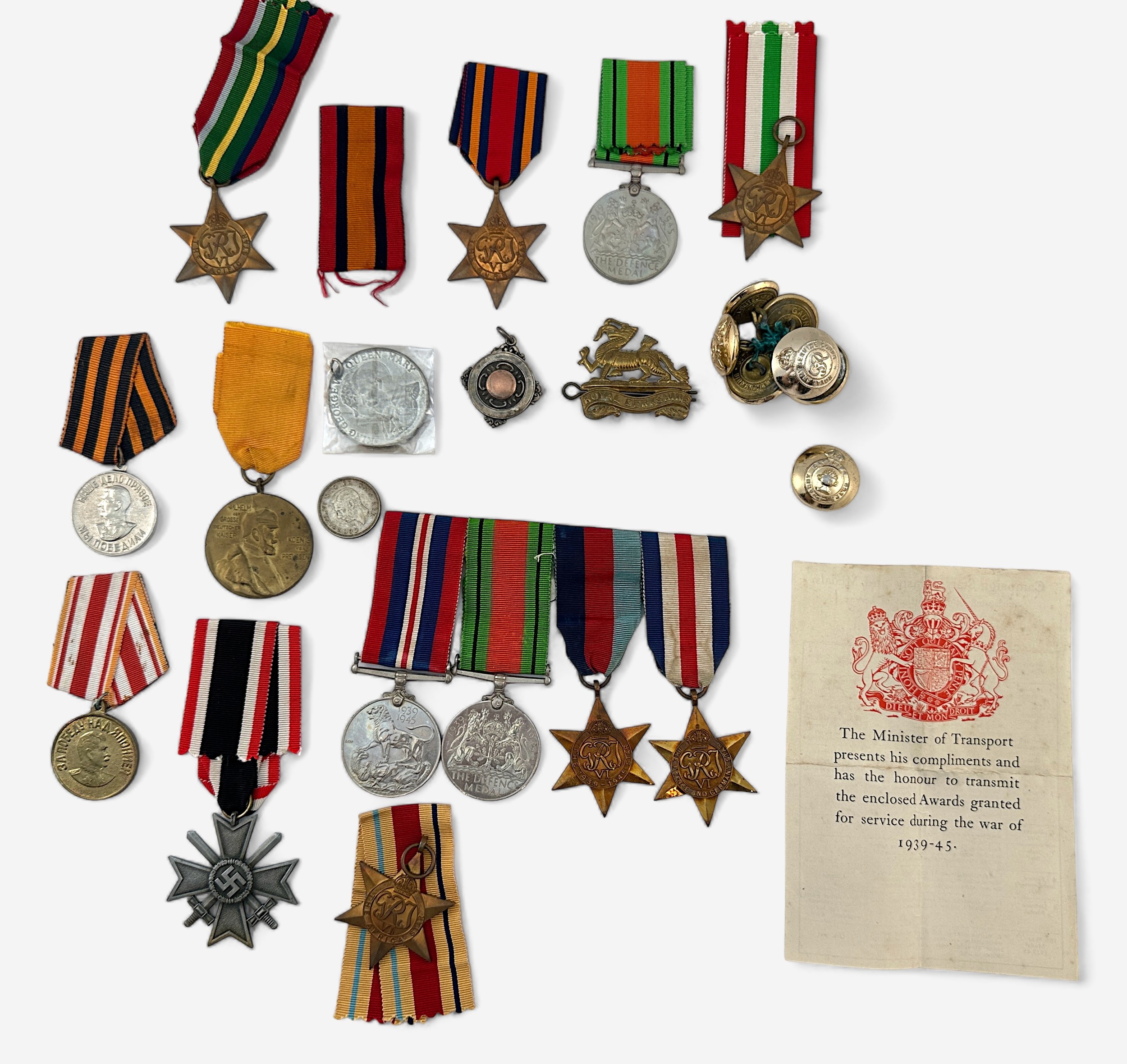 WW2 medals comprising a swing-mounted set of four and loose set of five, with addressed box, a